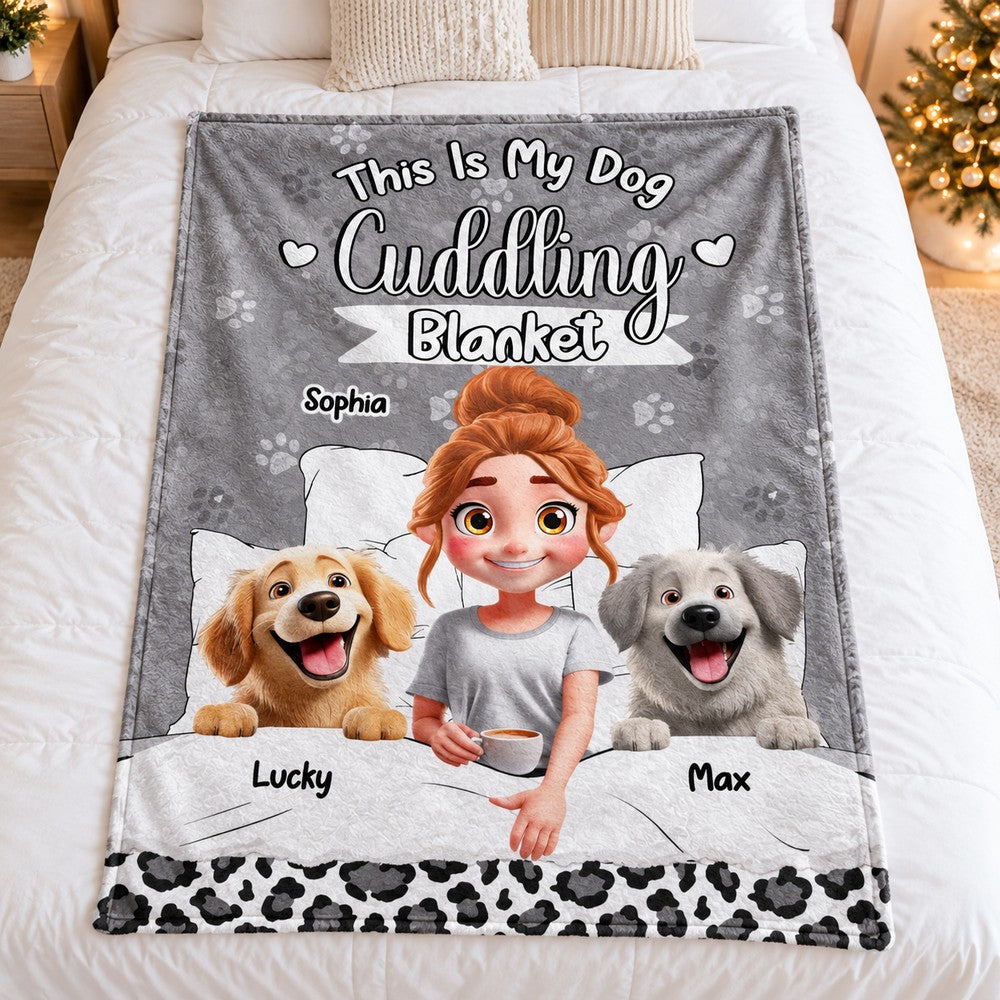 Personalized dog cuddling blanket spread flat on a bed with Christmas tree lights