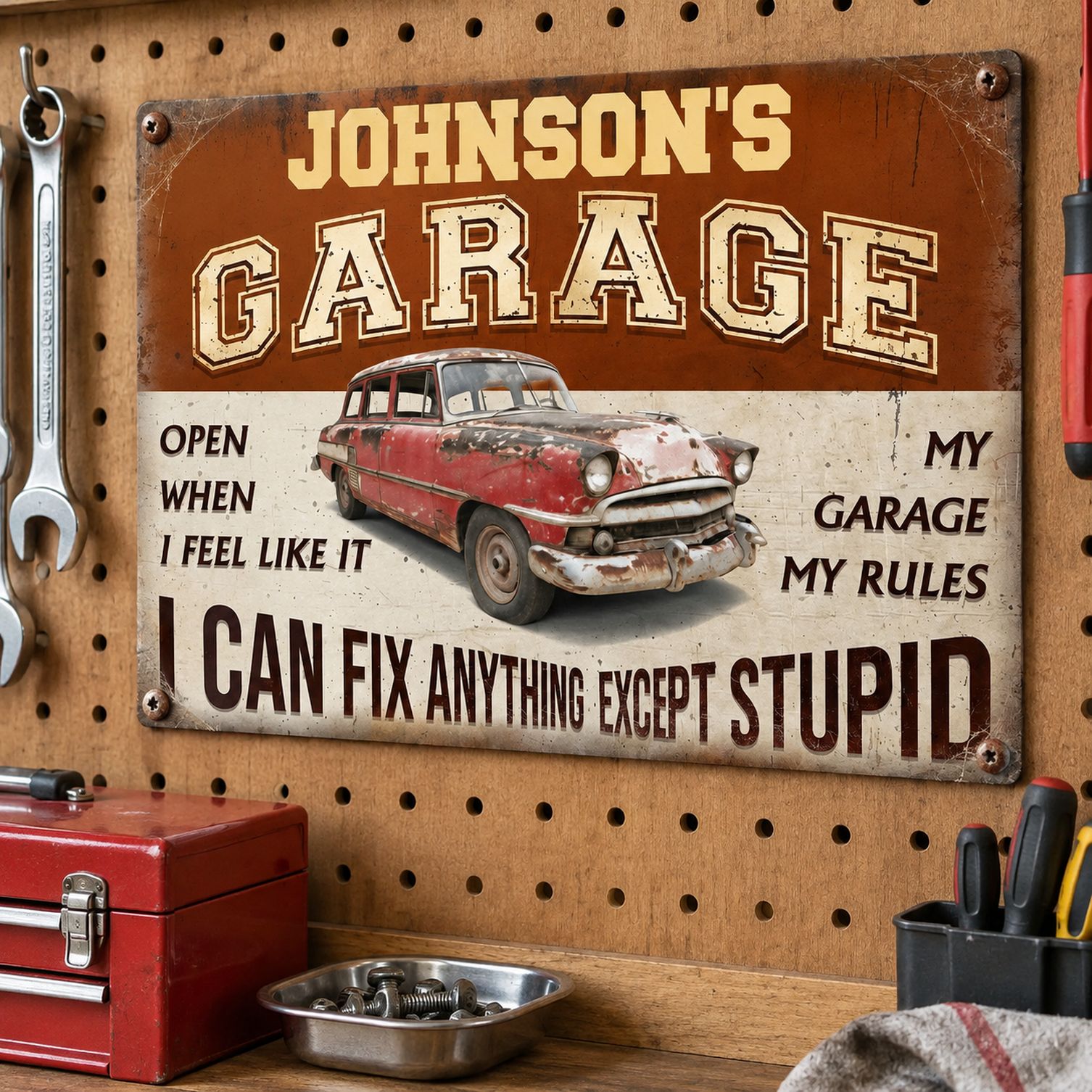 Personalized Garage Rules metal sign mounted above a garage workbench with tools
