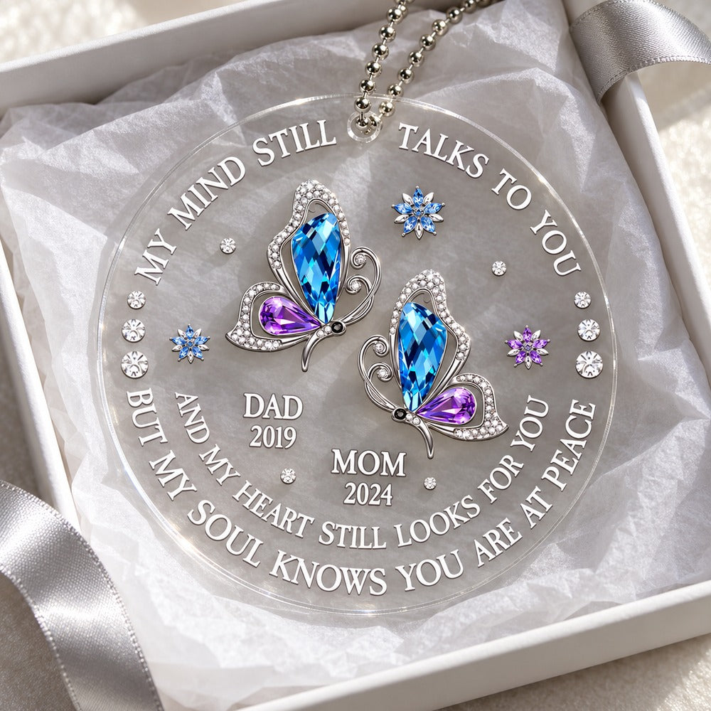 Sympathy gift acrylic car hanger for loss of parents nestled in a white gift box with tissue paper