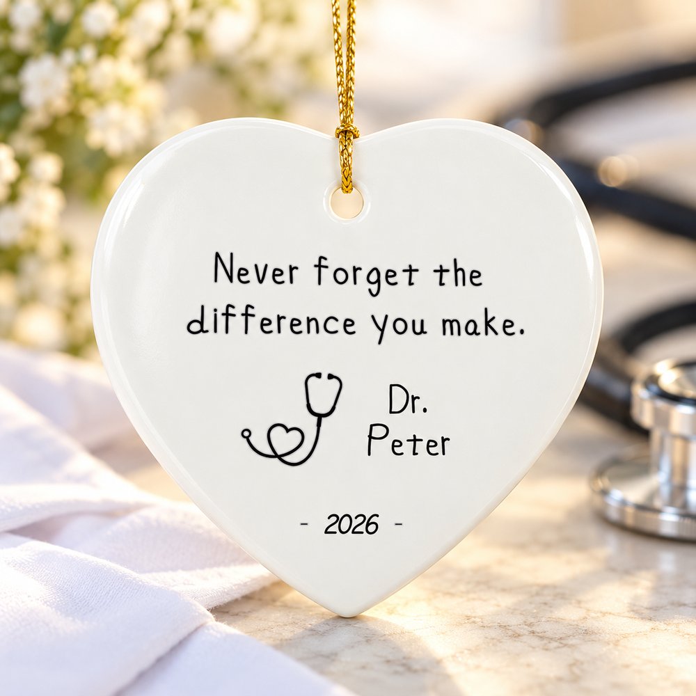Close up detail of glossy white ceramic heart ornament print quality and gold hanging cord