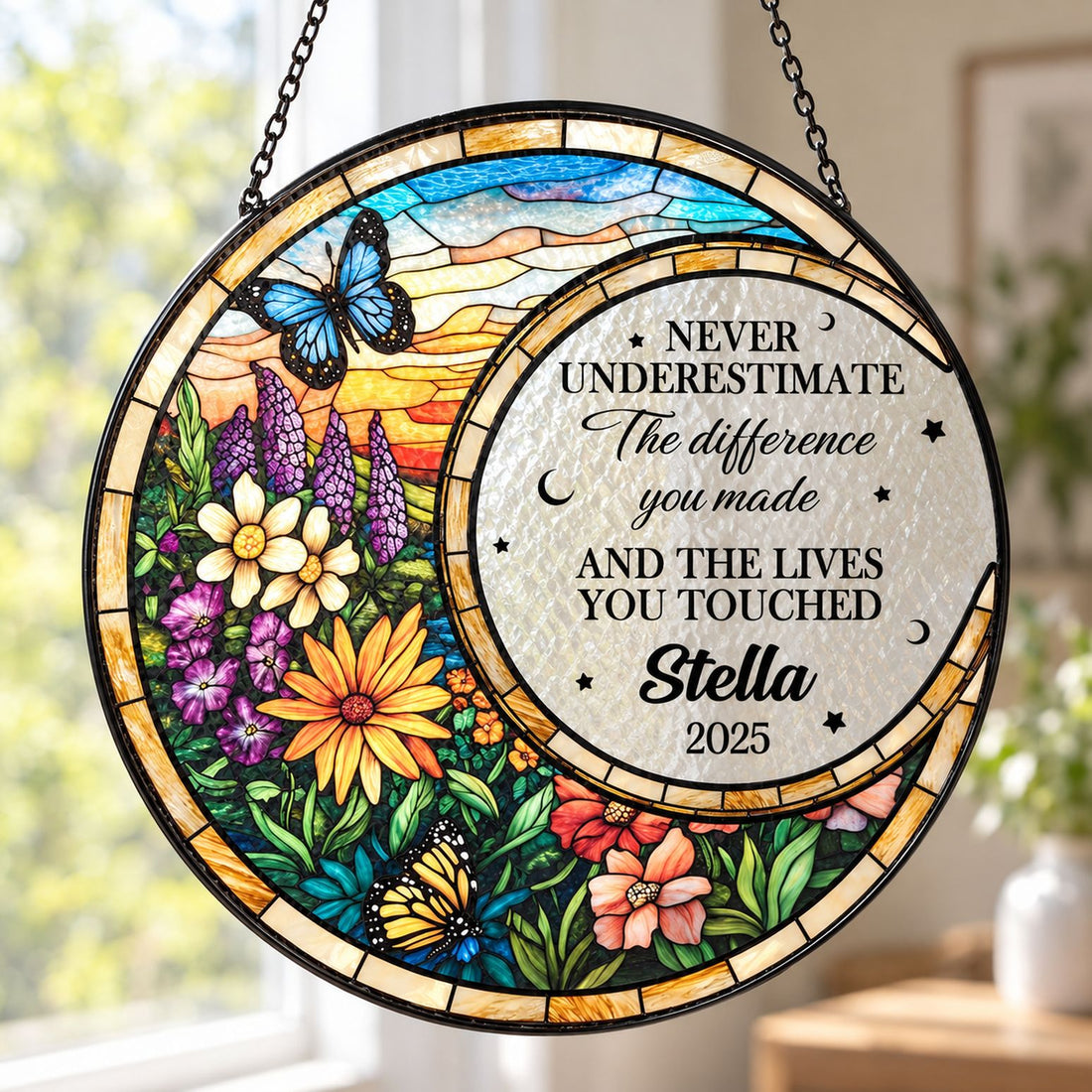 Close up of stained glass suncatcher showing textured glass surface and floral print details