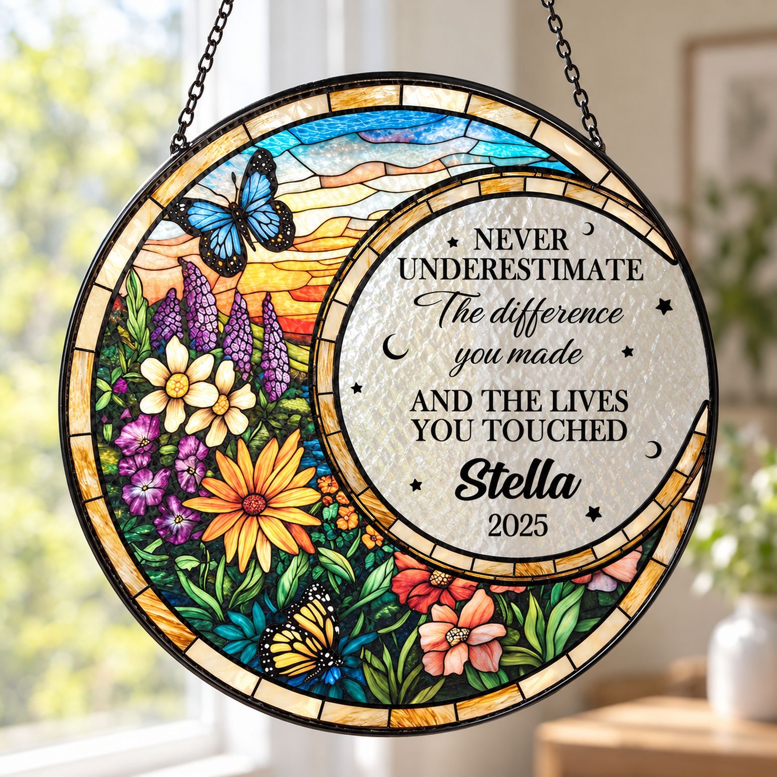 Close up of stained glass suncatcher showing textured glass surface and floral print details