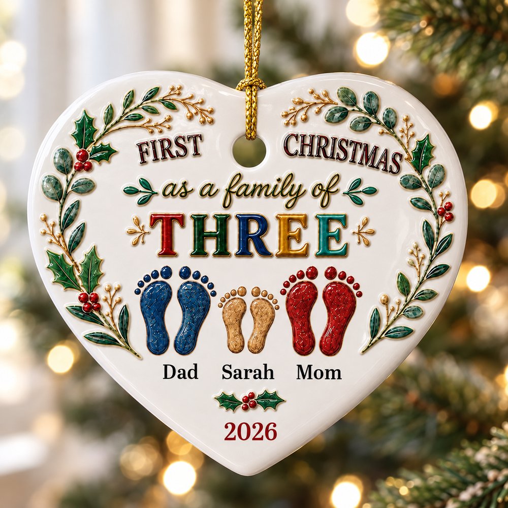 Macro closeup of glossy heart ceramic ornament showing faux 3D footprint print and smooth finish