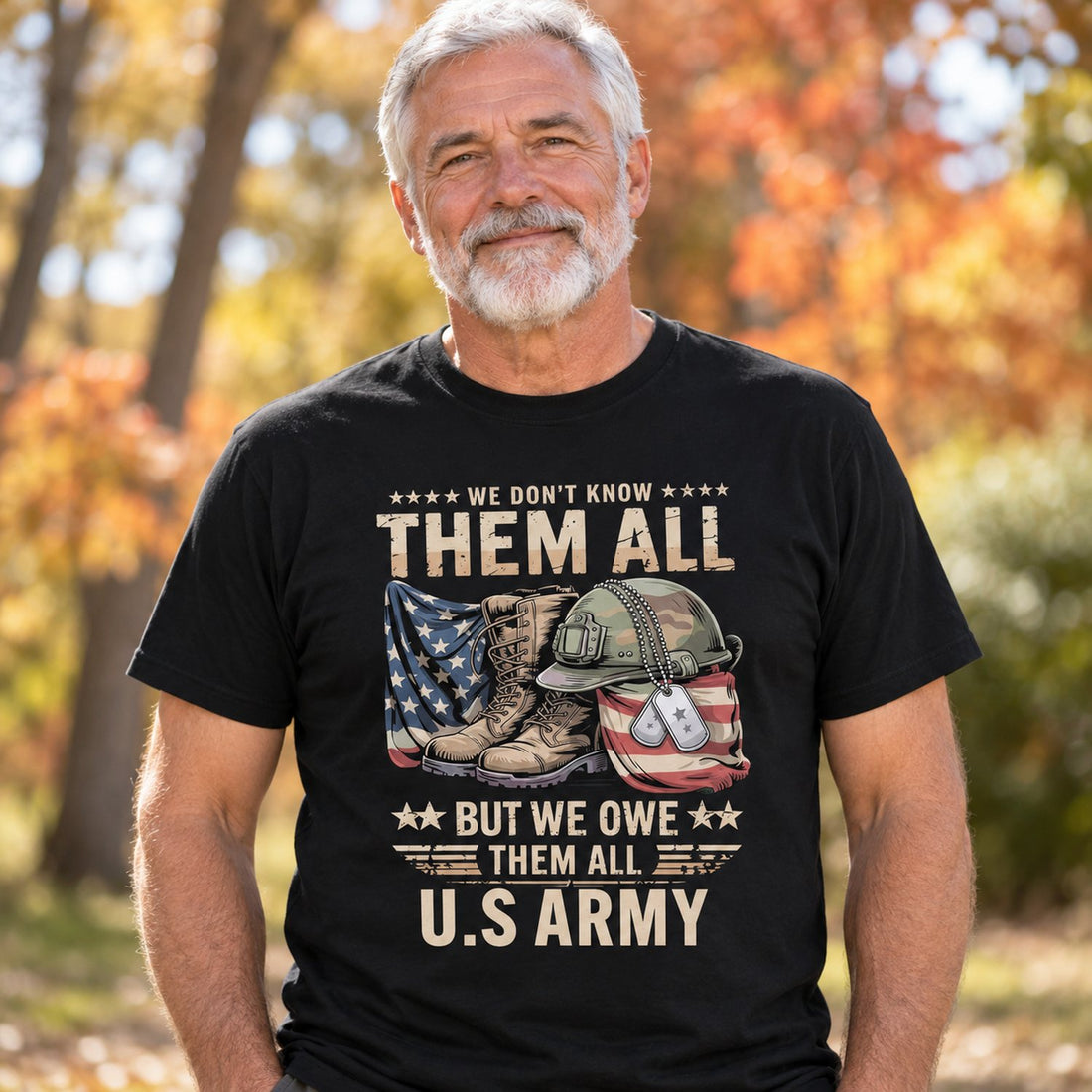 Military veteran grandpa wearing black We Owe Them All U.S Army personalized t-shirt outdoors