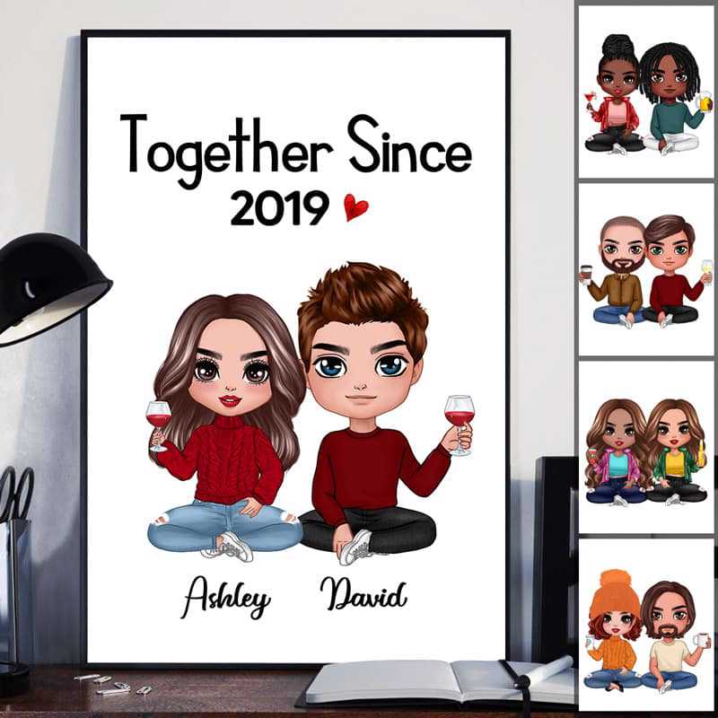 Personalized Doll Couple Sitting poster, leaning against a wall on a wooden floor