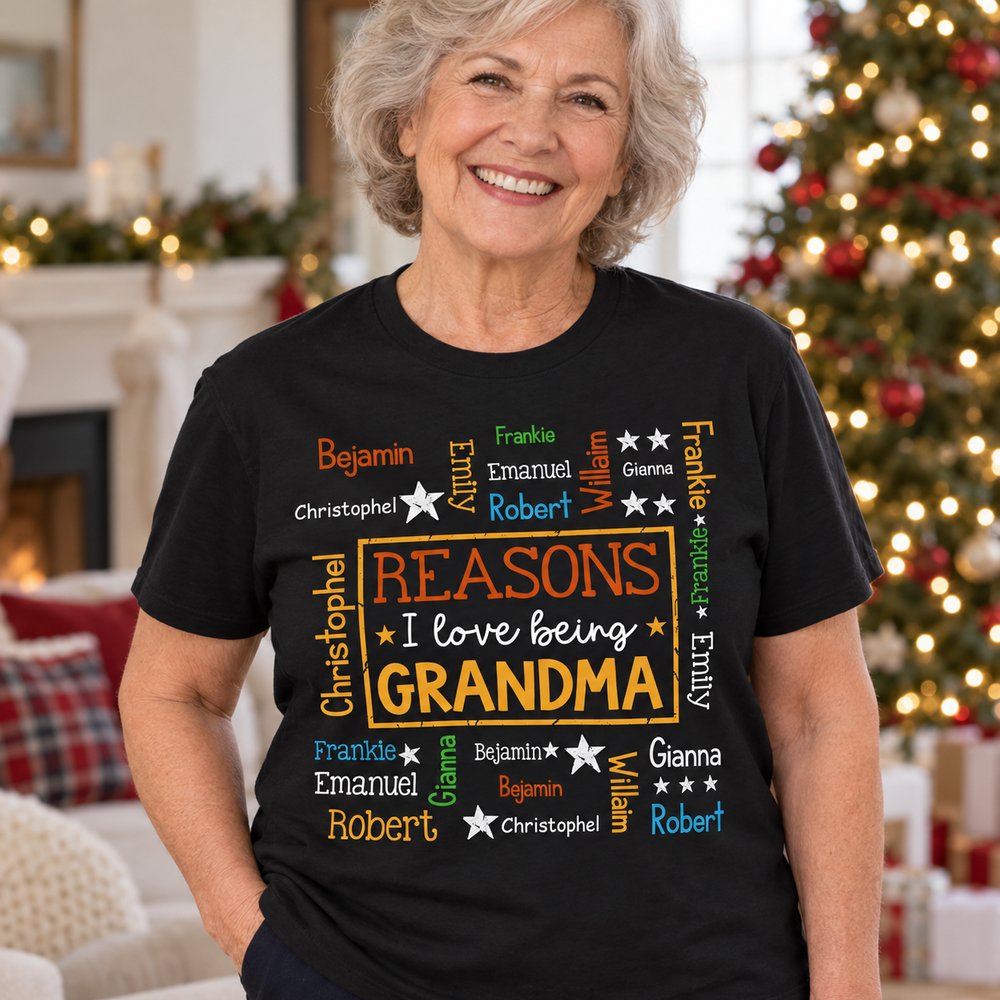Grandma wearing personalized Reasons I Love Being Grandma word art black t-shirt near Christmas tree