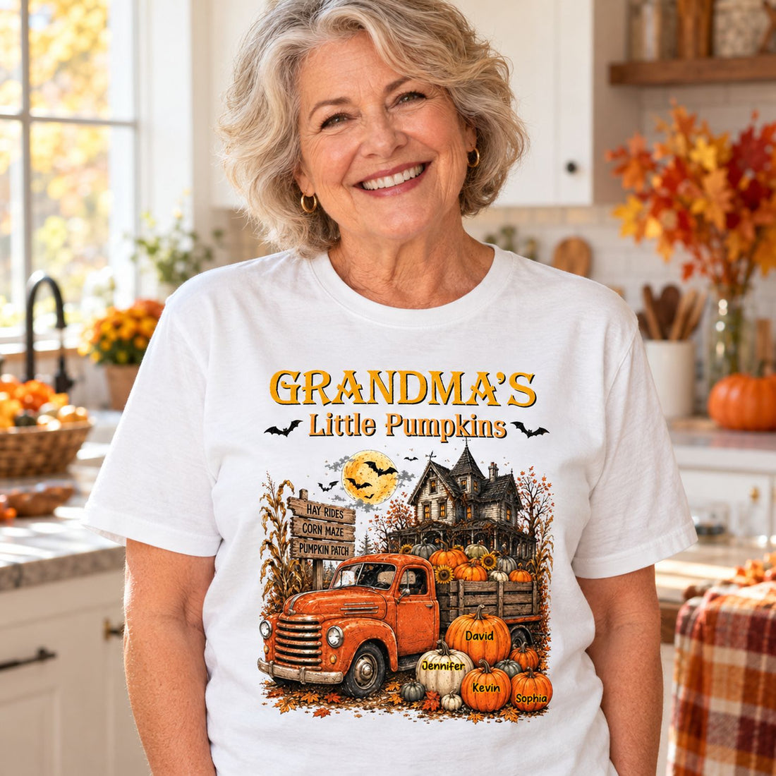 Grandma wearing personalized Grandma's Little Pumpkins vintage truck t-shirt in a bright autumn kitchen