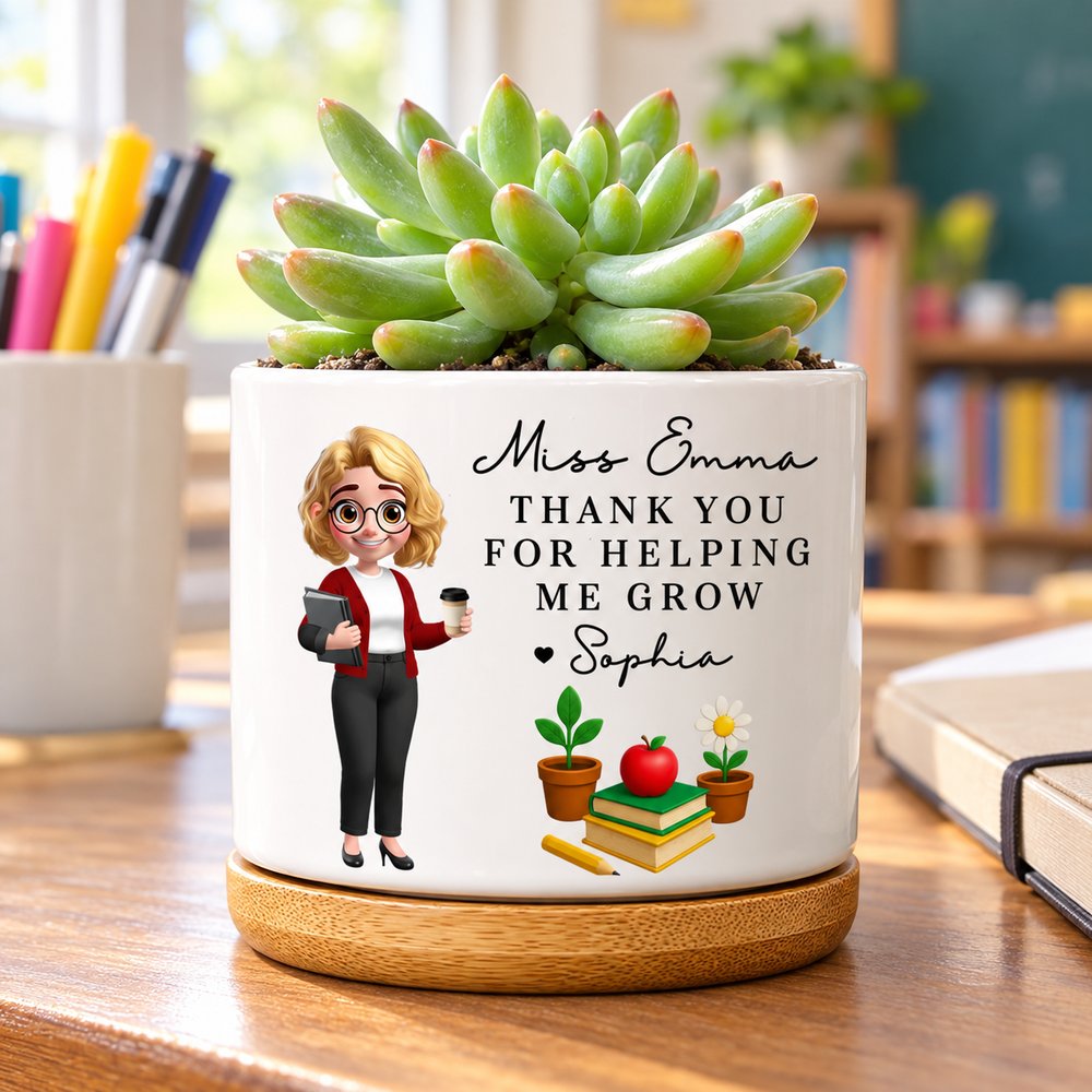 Personalized teacher ceramic plant pot with bamboo tray and succulent on a bright classroom desk