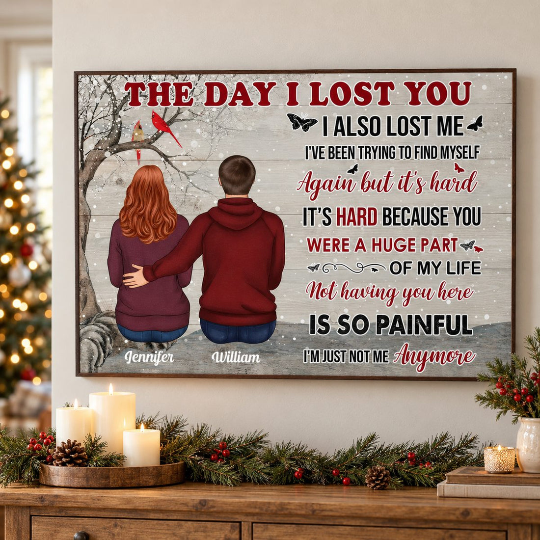 Personalized memorial canvas print hanging above a holiday console table with pine greenery and candles