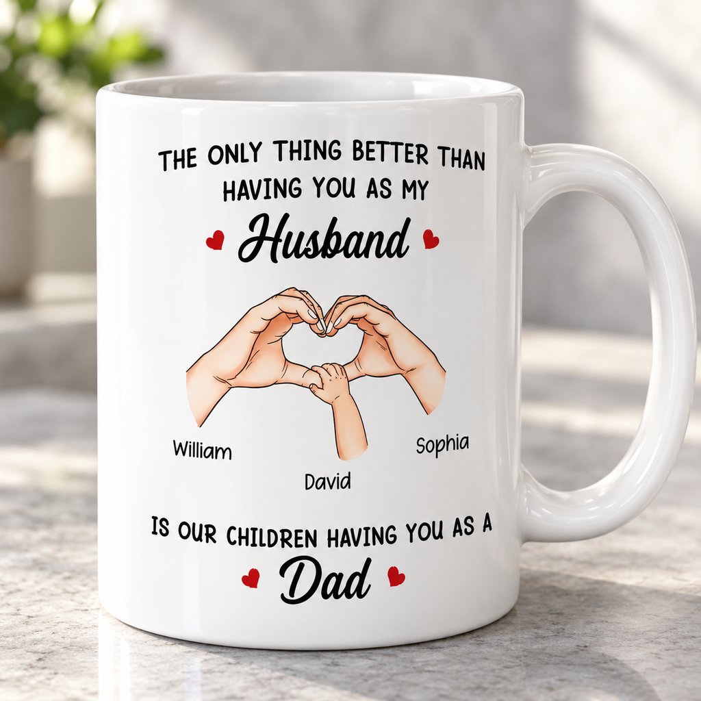 Close-up detail of family hands heart print on white ceramic mug