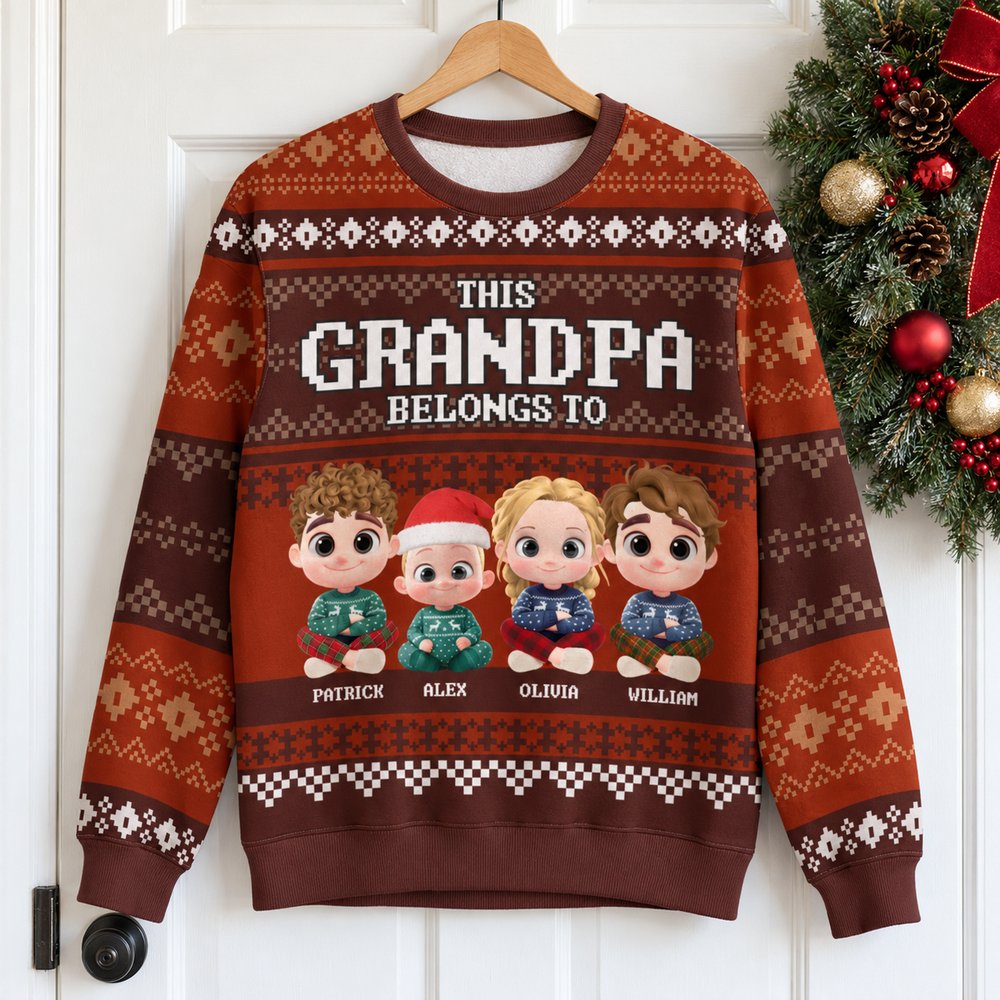 Full size view of personalized Grandpa ugly Christmas sweatshirt on a wooden hanger next to a holiday wreath