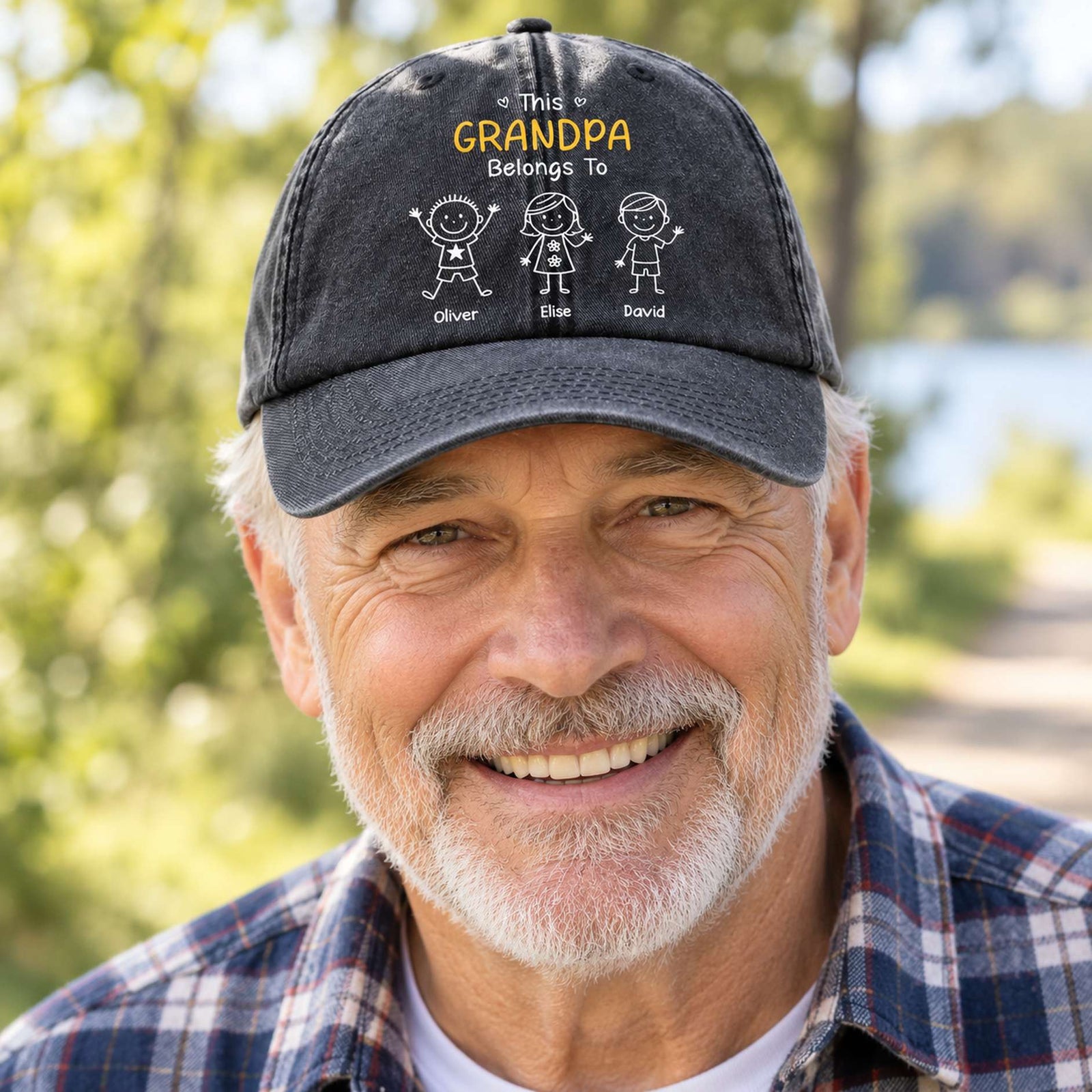 Grandpa wearing personalized This Grandpa Belongs To vintage washed black denim cap outdoors