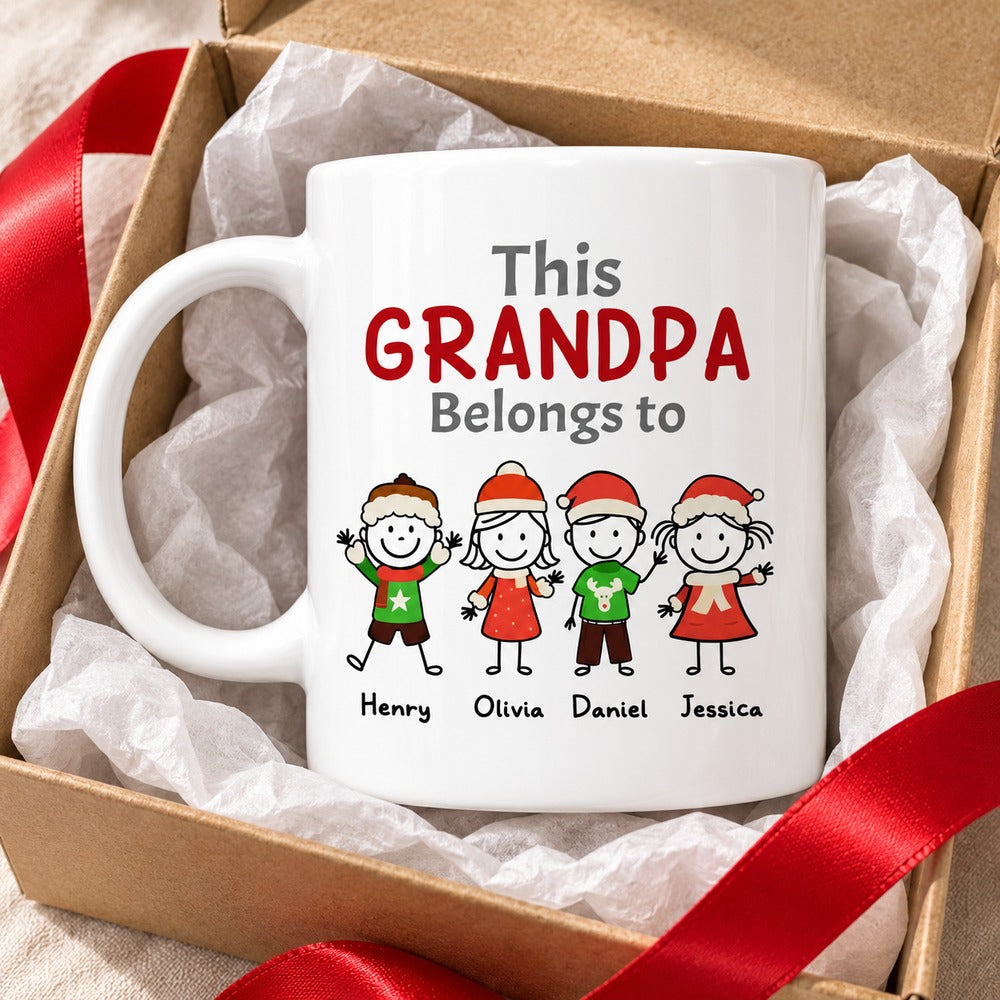 Personalized Grandpa Christmas mug in an open gift box with tissue paper and red ribbon