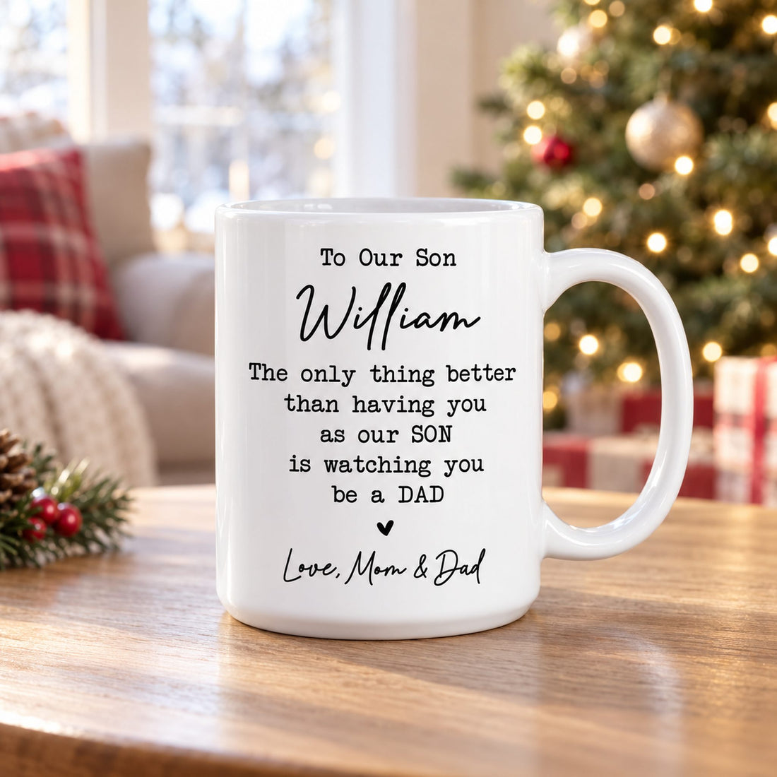 Personalized To Our Son ceramic mug on coffee table with Christmas tree in background