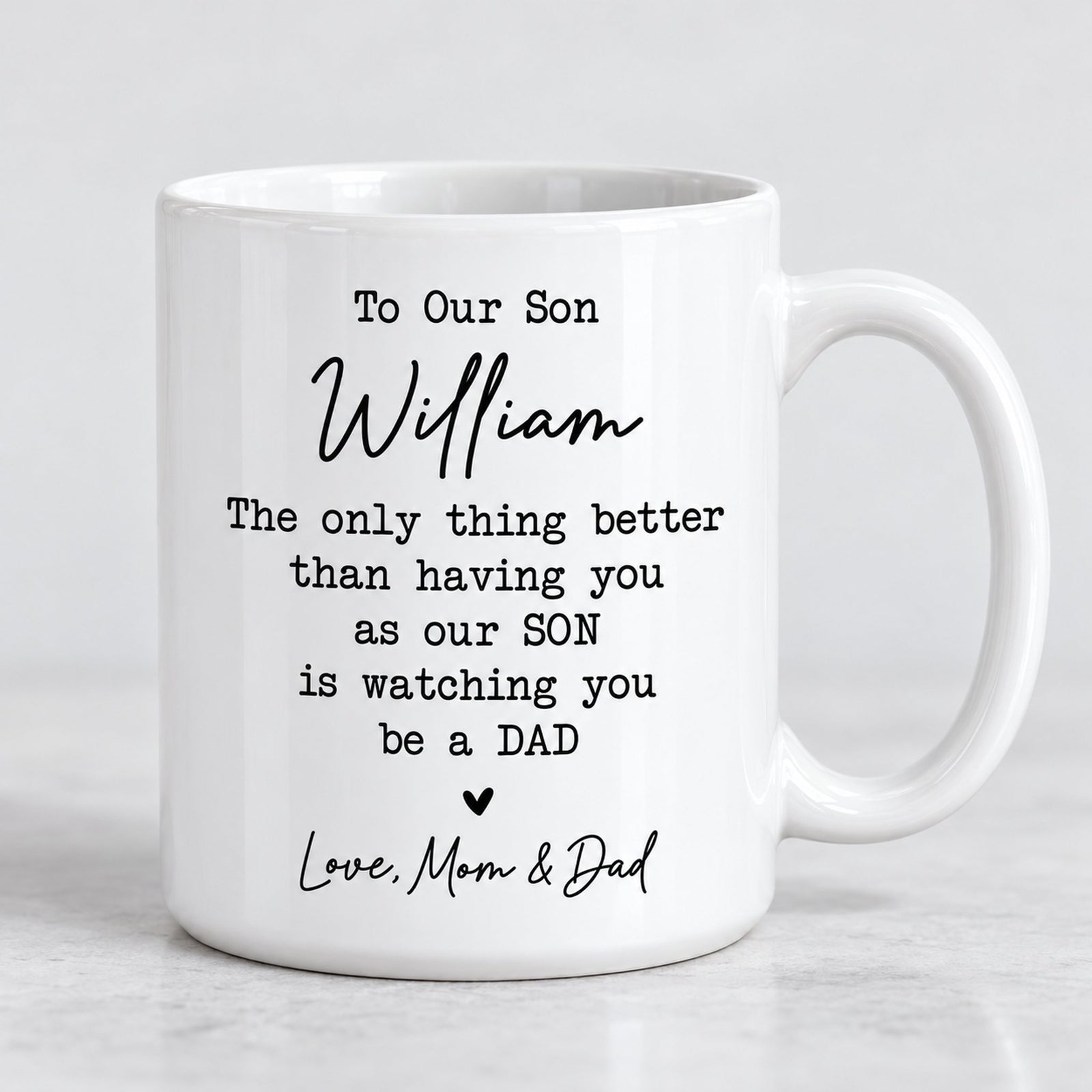 Macro closeup of glossy white ceramic mug showing crisp black personalized text print