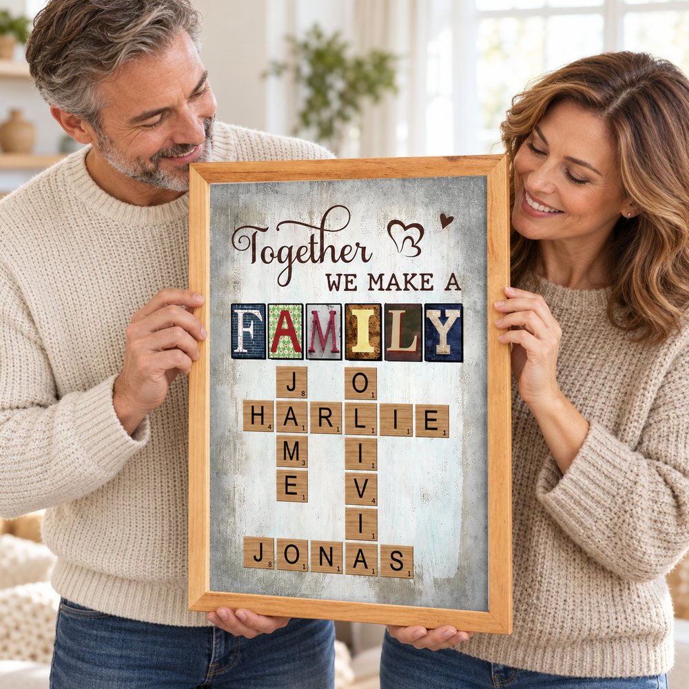 Mom and Dad holding their personalized Together We Make A Family crossword wall art print
