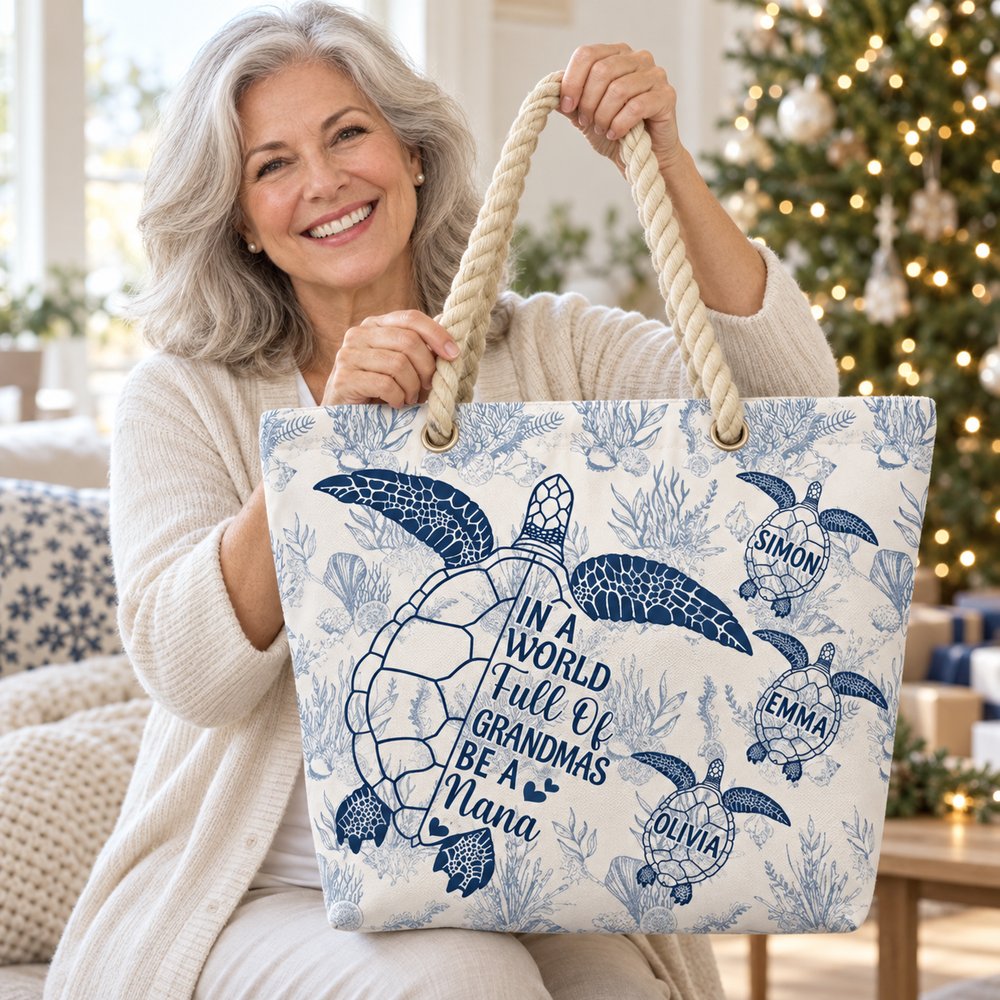 Grandma holding personalized sea turtle Toile de Jouy beach bag on Christmas morning
