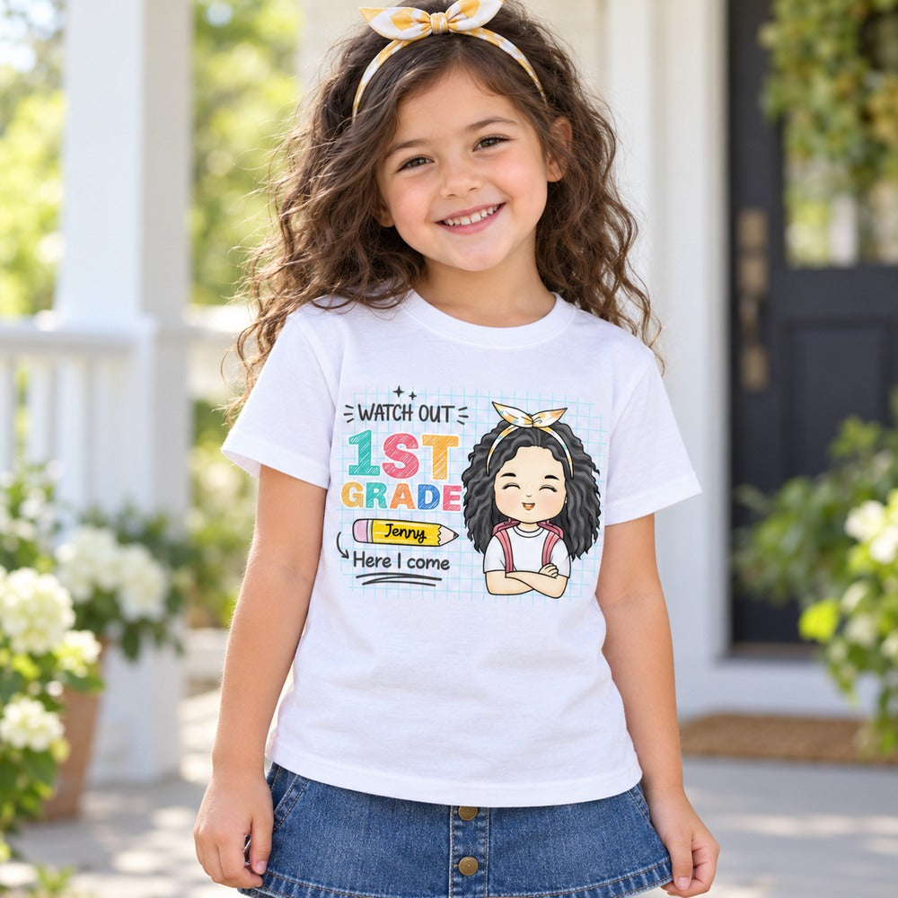 Young girl wearing custom 1st grade Watch Out Here I Come youth t-shirt on porch