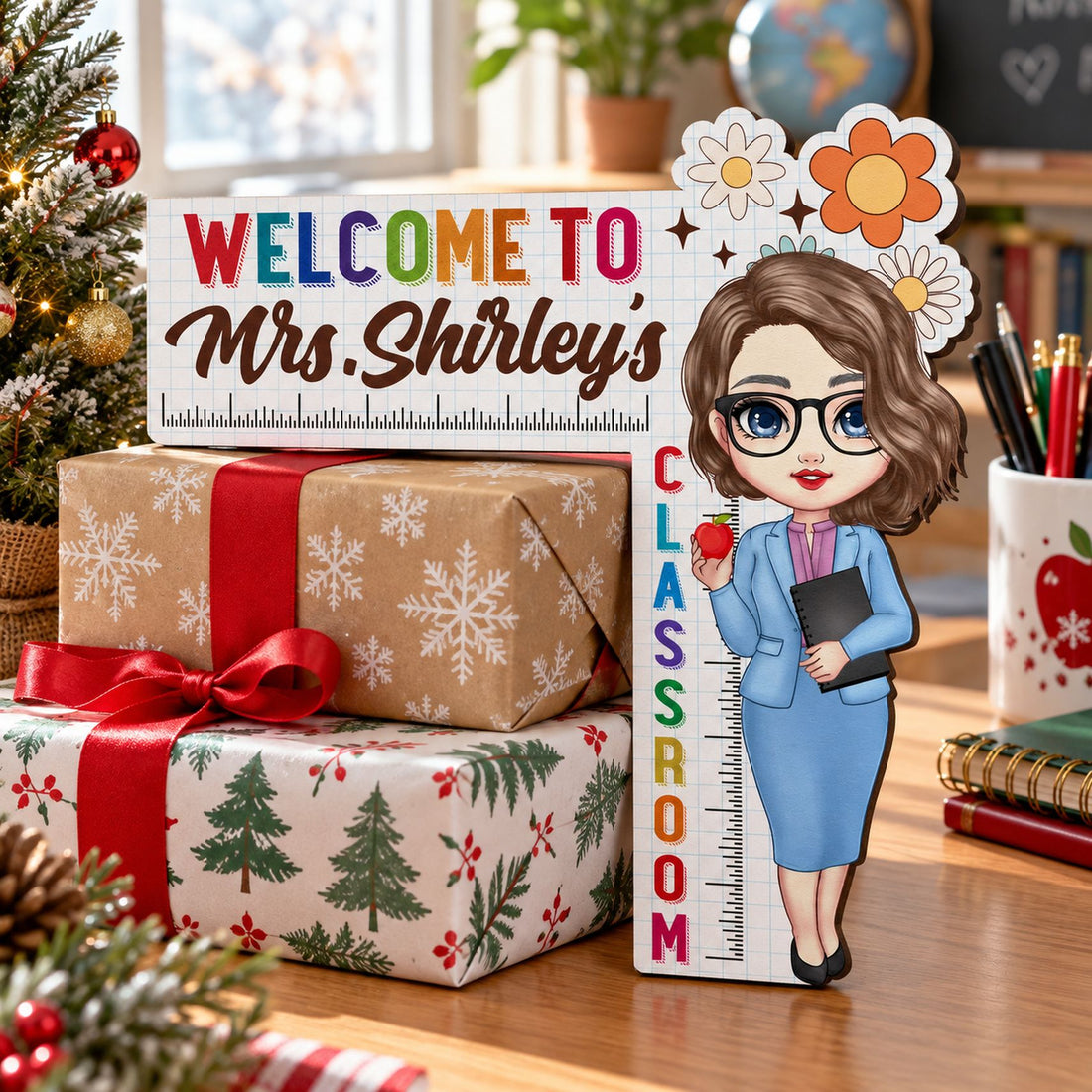Teacher door corner wood sign displayed next to holiday gifts and mini Christmas tree