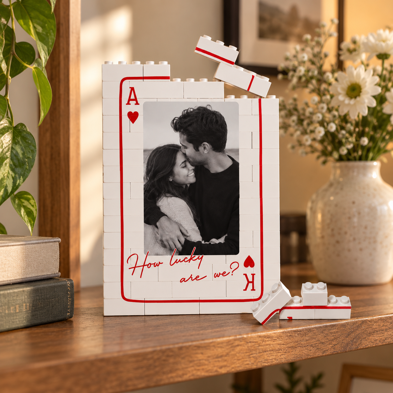 Custom photo King and Queen brick card frame on a living room shelf with flowers