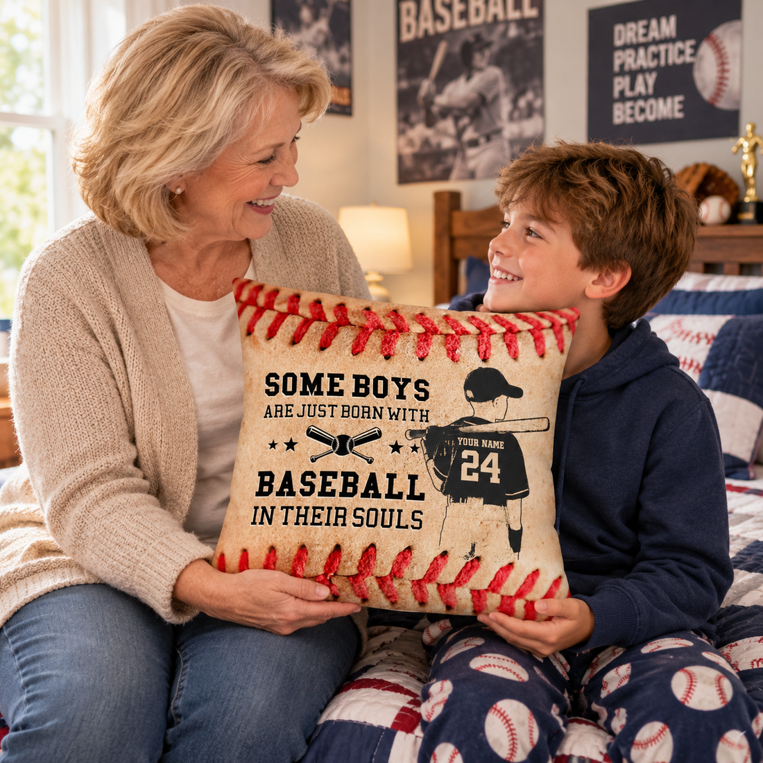 Grandmother giving a personalized Love Baseball grandson pillow to a boy on a bed in a baseball-themed bedroom