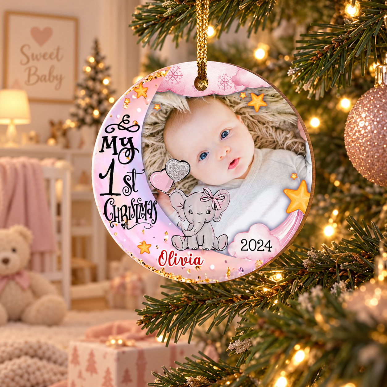 Personalized circle wood Baby's First Christmas ornament hanging on a tree with soft lights