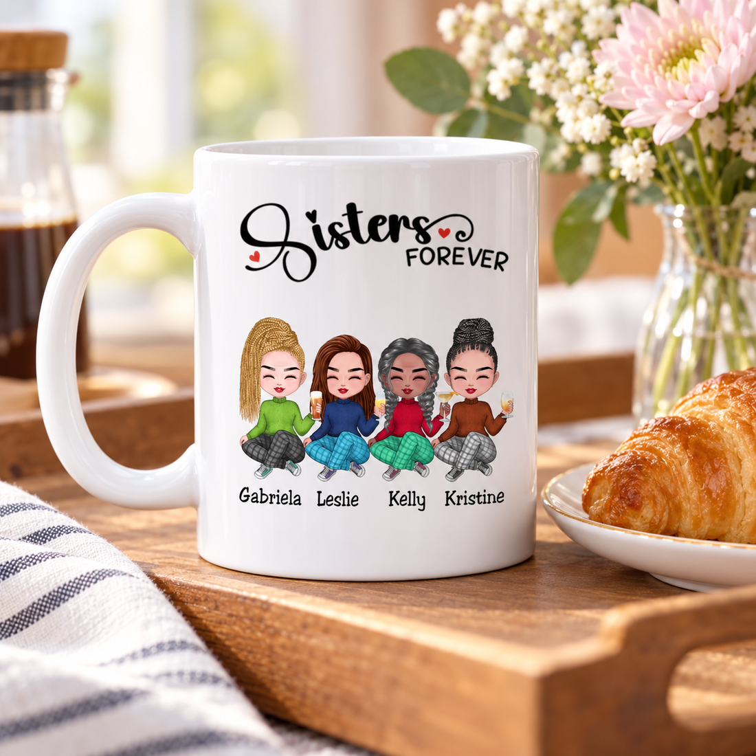 Personalized Sisters Forever mug on a breakfast tray with croissant and flowers