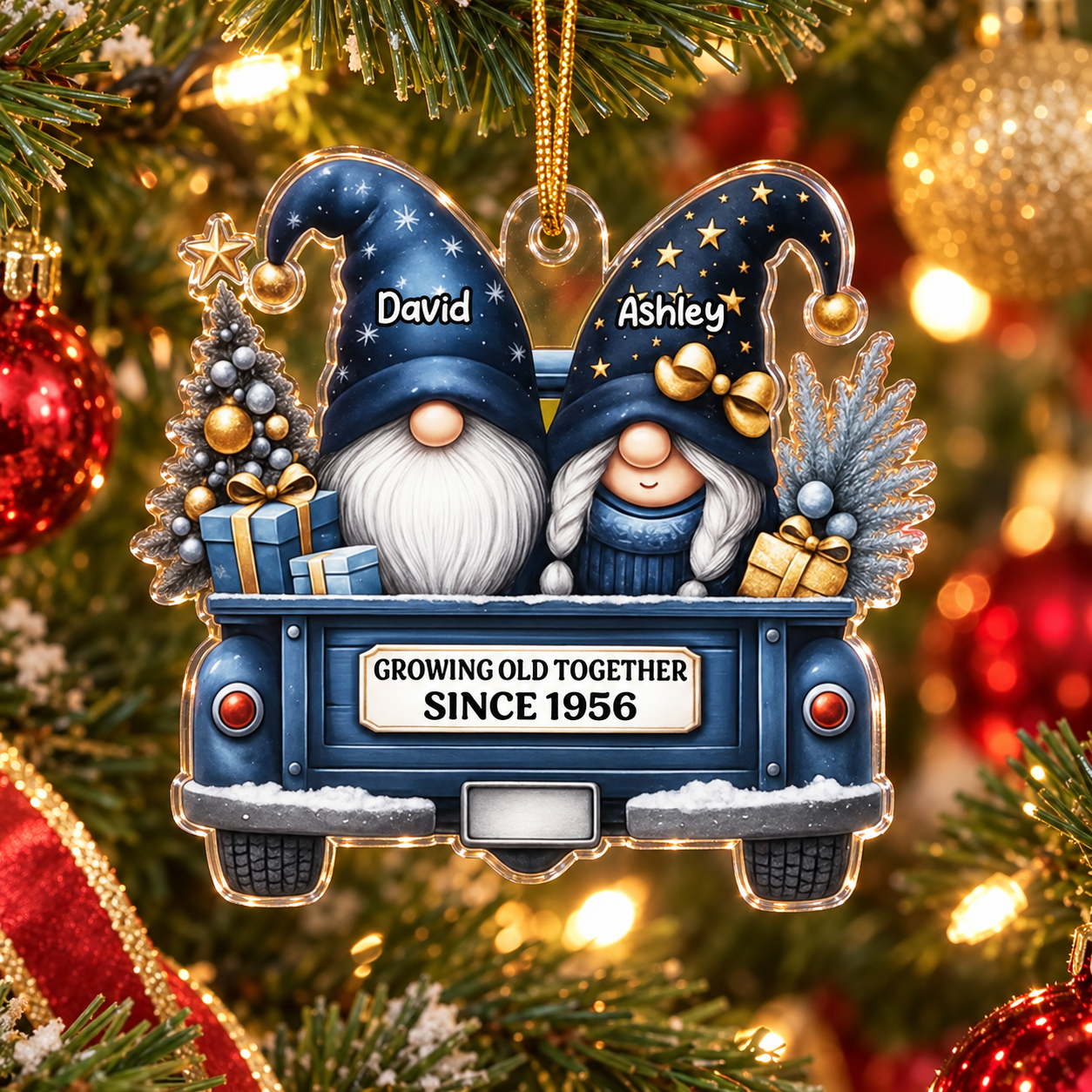 Personalized gnome couple truck acrylic ornament hanging on a decorated Christmas tree