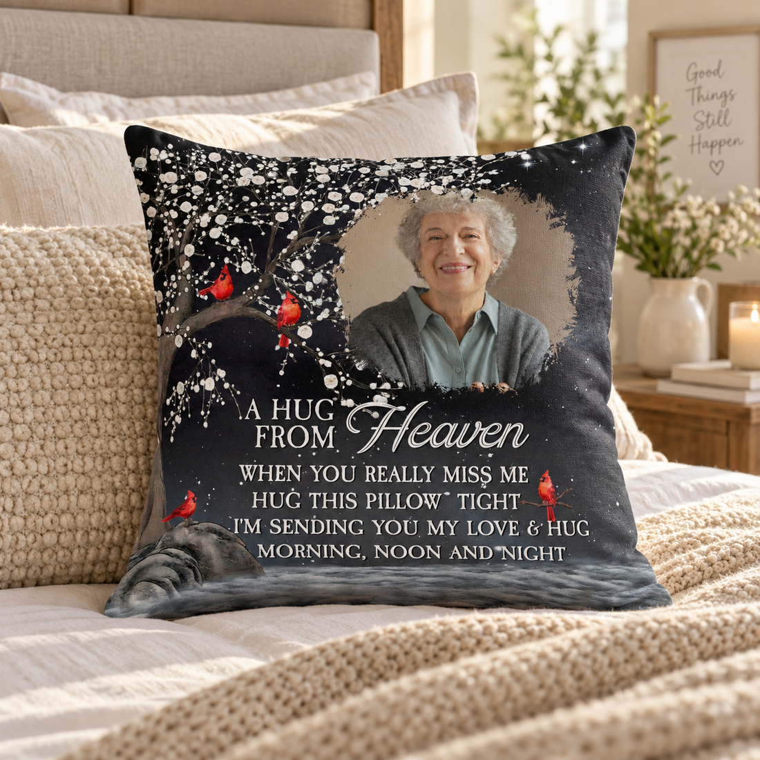 A Hug From Heaven memorial pillow with cardinals and a grandmother photo on a made bed