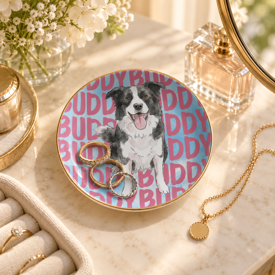 Personalized pet portrait ceramic jewelry dish on a vanity with rings and a necklace