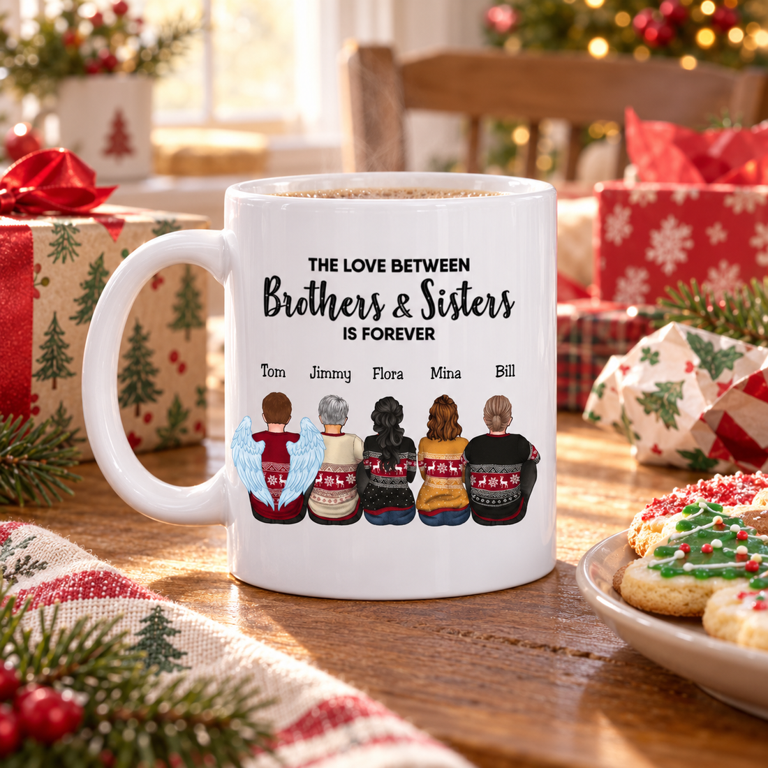 Personalized siblings mug on a kitchen table at Christmas morning with wrapping paper and cookies