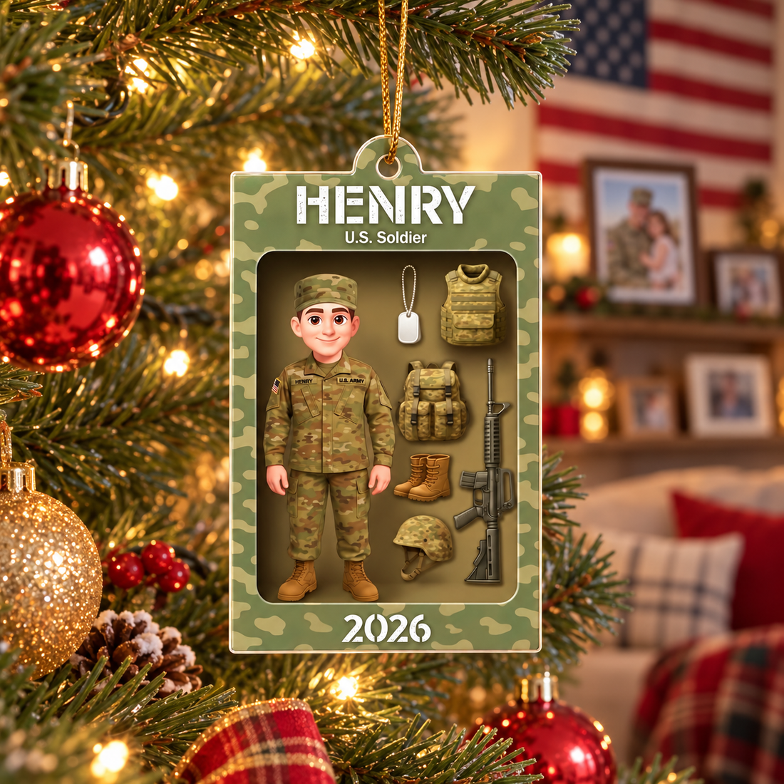 Personalized U.S. Soldier camo ornament with name Henry hanging on a Christmas tree with an American flag behind