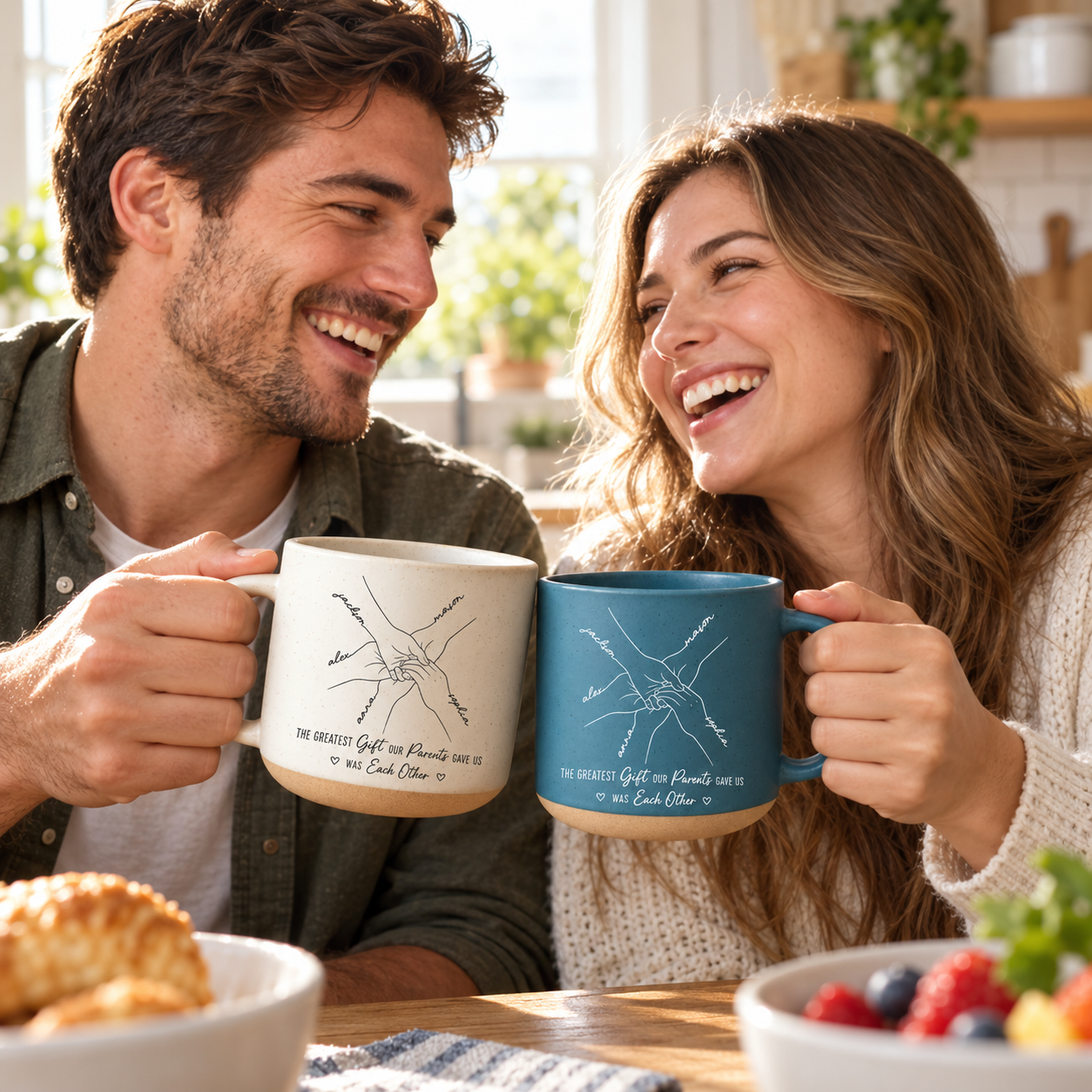 Brother and sister laughing with custom line art hands pottery mugs in a sunny kitchen