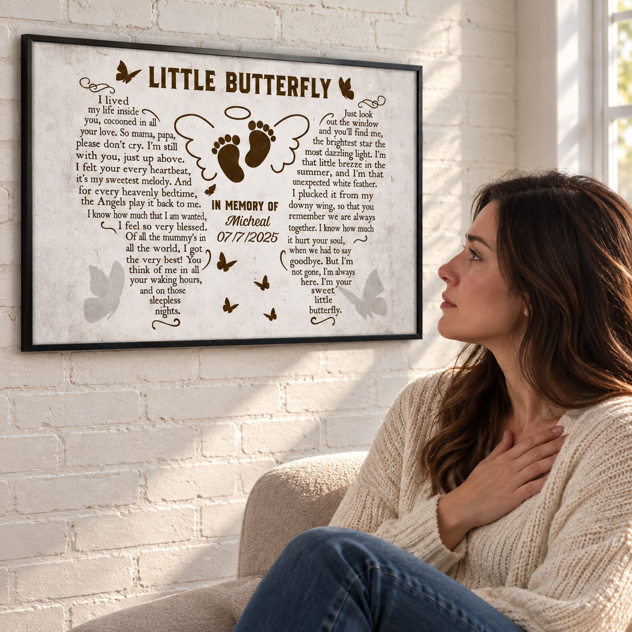 Woman with hand on heart looking at a Little Butterfly memorial poster, a sympathy keepsake