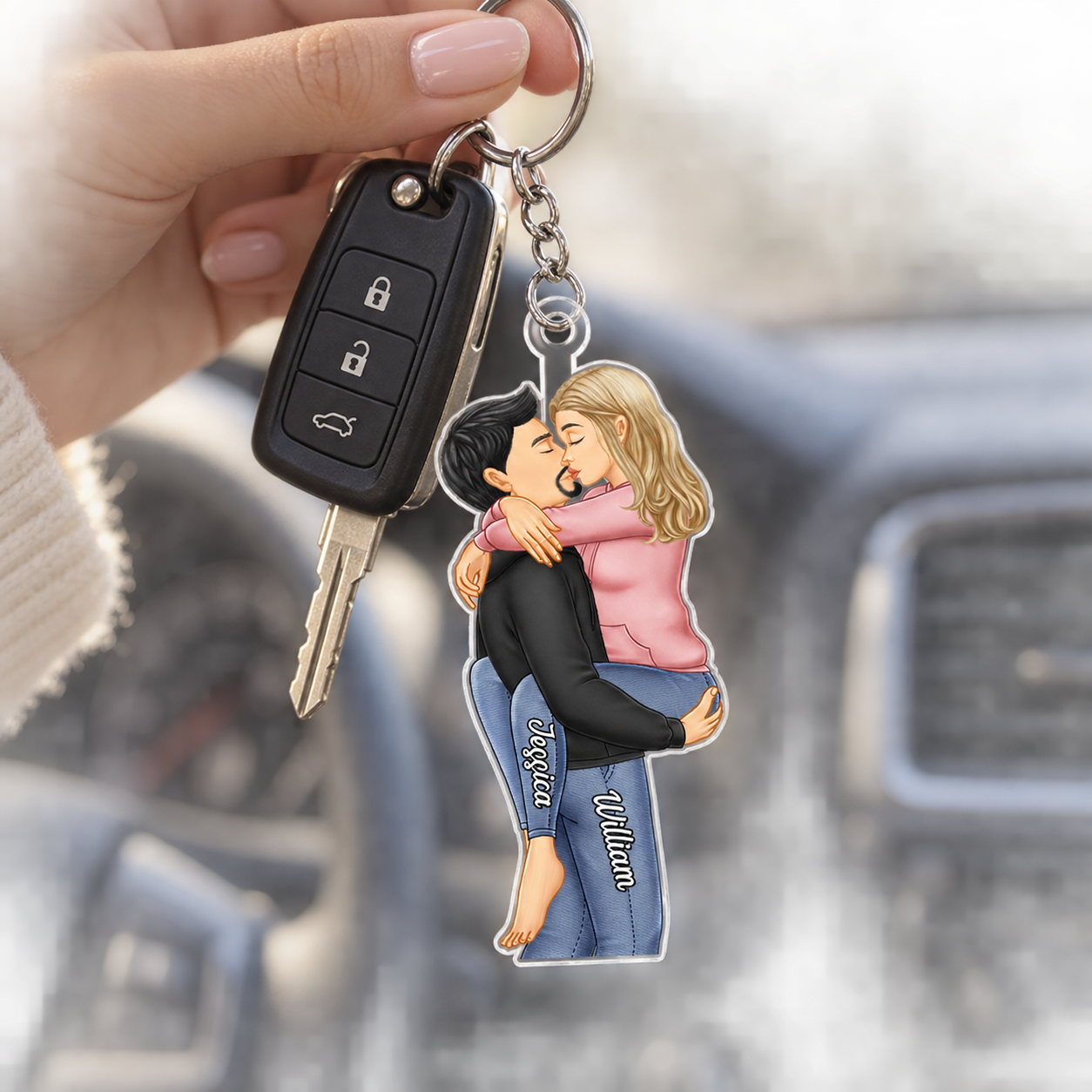 Personalized kissing couple acrylic keychain on car keys inside a car
