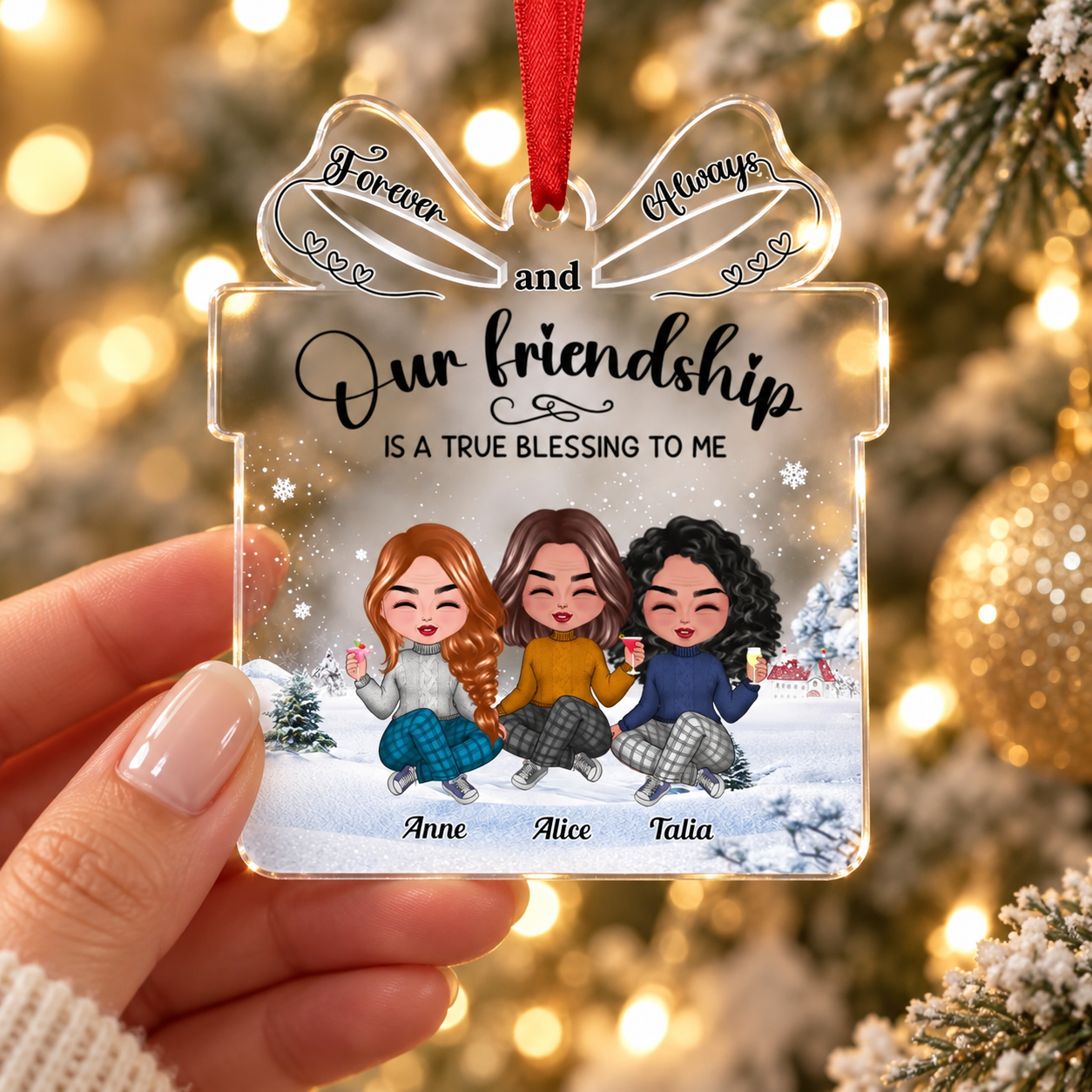 Woman's hand holding a custom friendship acrylic ornament with Christmas lights behind
