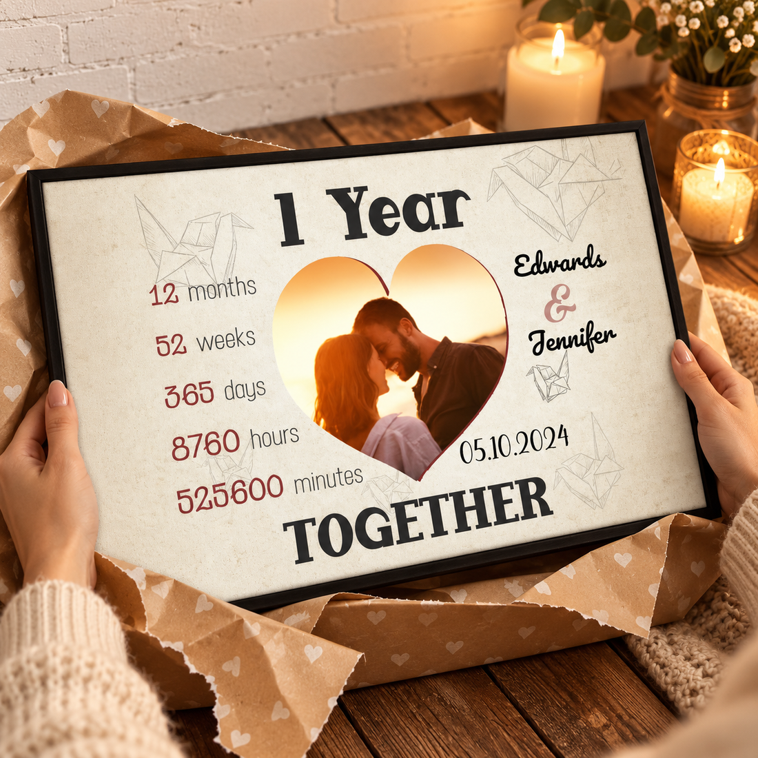 Woman unwrapping a personalized heart-shaped couple canvas as an anniversary gift