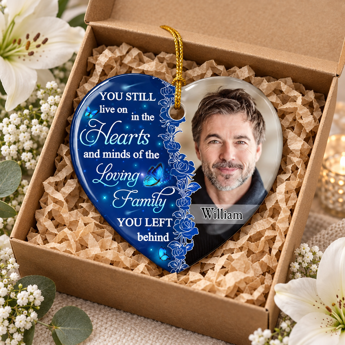 Custom heart shaped memorial photo ornament in a kraft gift box with white flowers