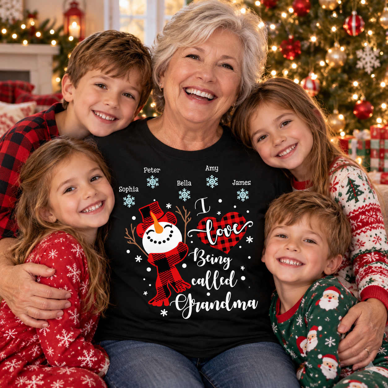 Personalized I Love Being Called Grandma snowman Christmas t-shirt worn by a grandmother with her grandkids