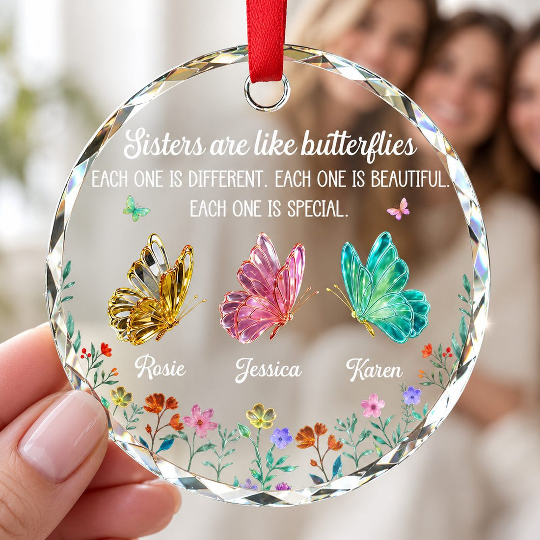 Close-up of the Personalized Circle Glass Ornament showing butterfly artwork and custom names.