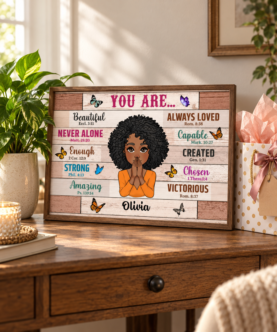 Custom You Are affirmation poster with name Olivia on a desk beside a plant and a gift bag
