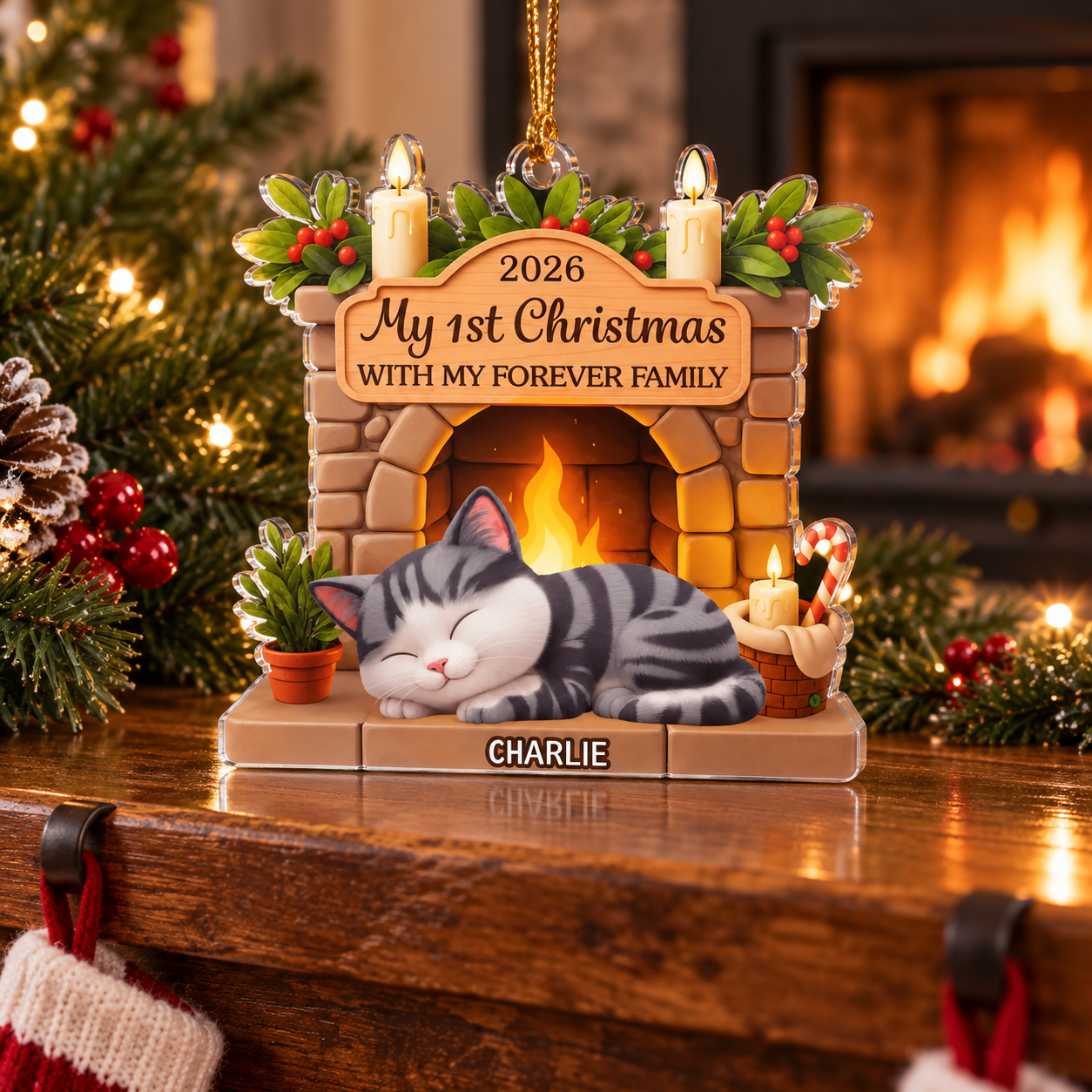 Personalized cat fireplace acrylic ornament on a mantel with red stockings by a Christmas tree