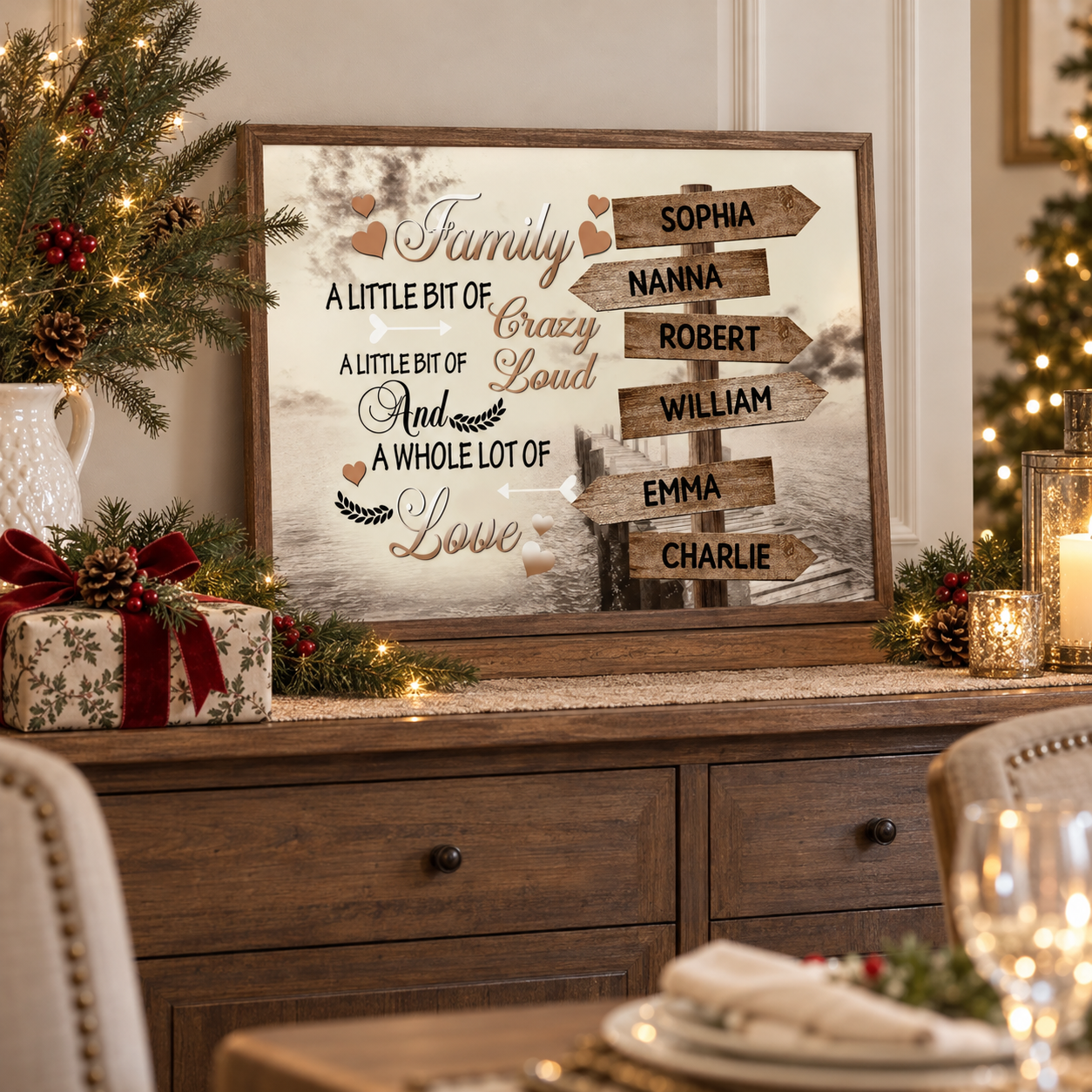 Personalized A Little Bit of Crazy family signpost poster on a sideboard beside a Christmas gift and pine