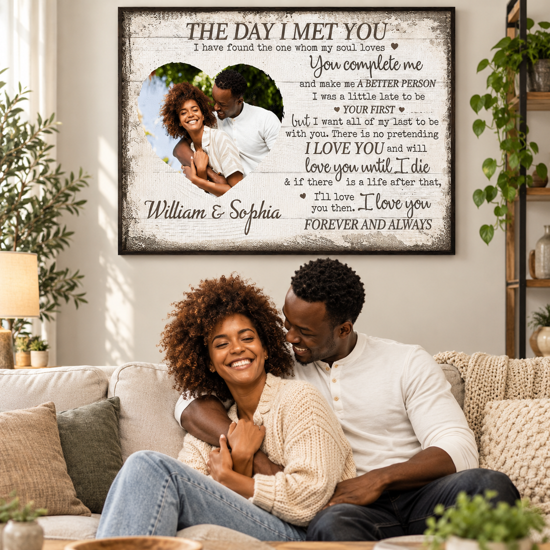 Custom The Day I Met You couple photo poster above a sofa with a smiling Black couple