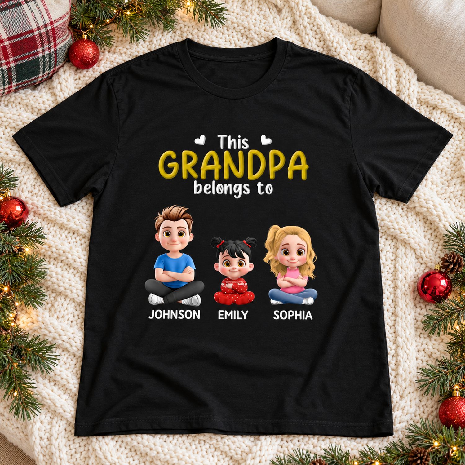 Personalized This Grandpa Belongs To black t-shirt laid on a cozy sofa with Christmas garland
