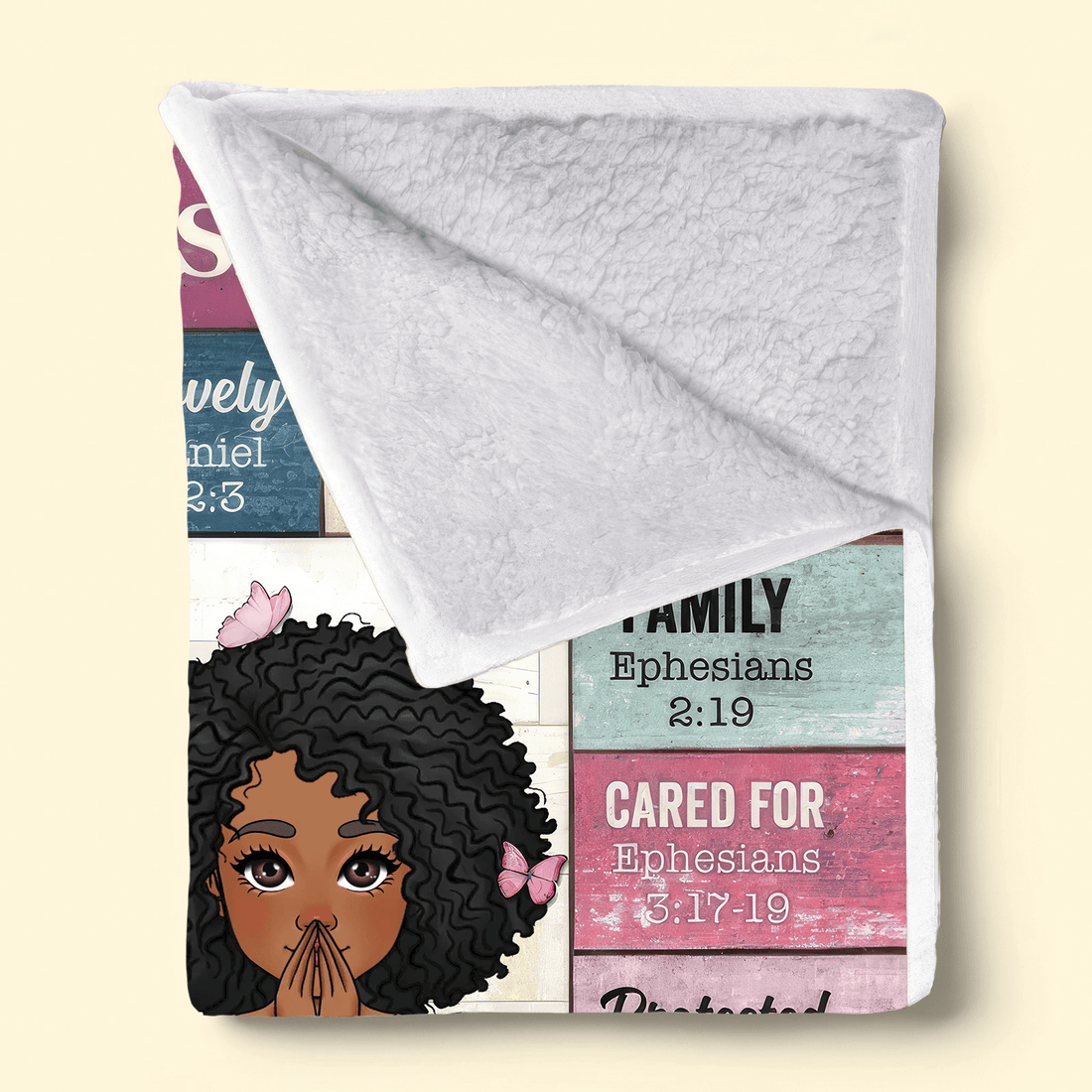 "God Says I Am" Bible verse blanket with child avatar and name, spread across a bed