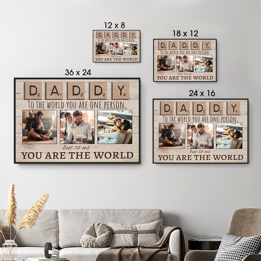 Personalized Daddy To The World You Are One Person But To Us You Are The World poster, size options shown on a sofa wall