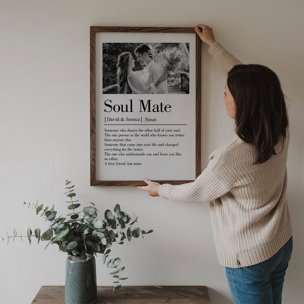 Custom Photo Soul Mate Defination poster, a woman hanging the framed print on a wall