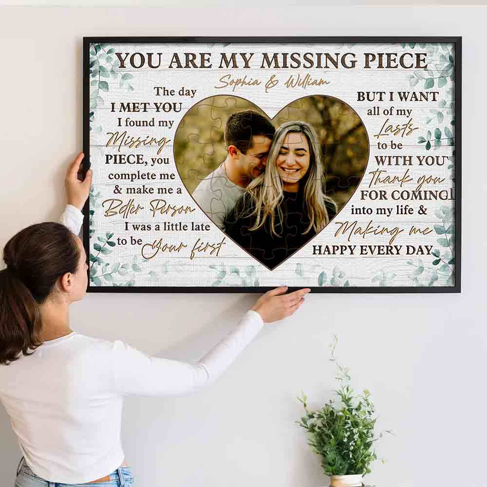 Personalized Custom Photo Couple You Are My Missing Piece canvas print, a woman hanging the framed print on a wall