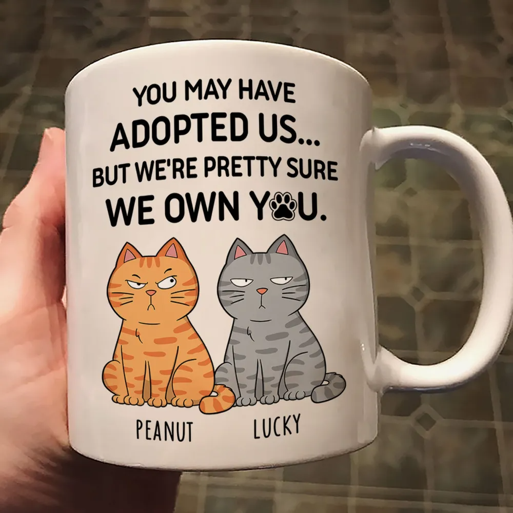 Funny Cat Mug: "You May Have Adopted Us But We Own You" Personalized Coffee Cup - Custom Names & Multiple Cats | Gift for Cat Mom or Dad